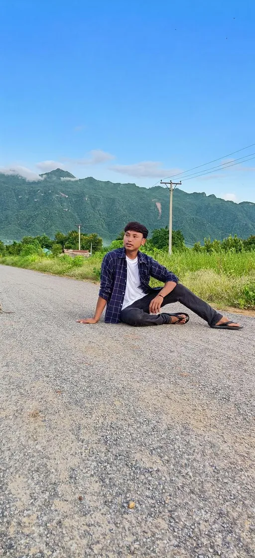 Prompt: Change color sky blue. Mountain color more green