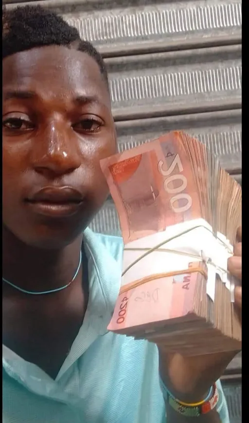 Prompt: ALi Boubacar African money images 1 million Ghanaian cedis ALi Boubacar Bonkano African richest man in The Whole World