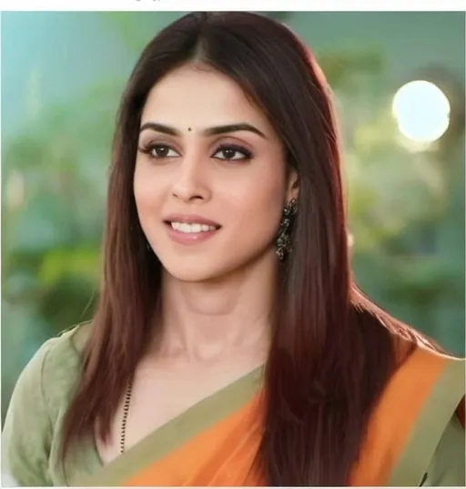 Prompt: Genelia Deshmukh. A beautiful cute south indian girl. Bollywood, Slim body, elegant smile, Wearing a sea green and orange Detailed illustration saree. She has long dark Brown hair and a chain around her neck. flattering body shape, high-res, realistic, detailed, glamorous, traditional attire, She is laughing.professional lighting, with stunning back shape, the girls dress is so transparent that her entire nody is seen,