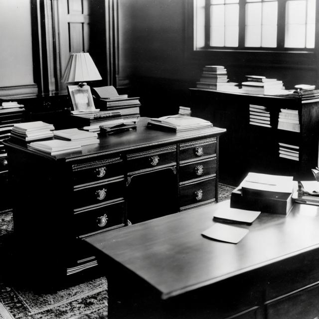 Prompt: Albert Einstein's desk on the day of his death.