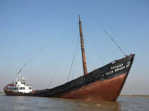 Prompt: The Romanian  Prince,   the melted sword in the keel of the Tohani vessel aground in Sulina. On the bow write Tohani. The photo source not to be modified. 
