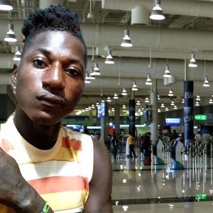 Prompt: ALi Boubacar has arrived at Dubai Airport."