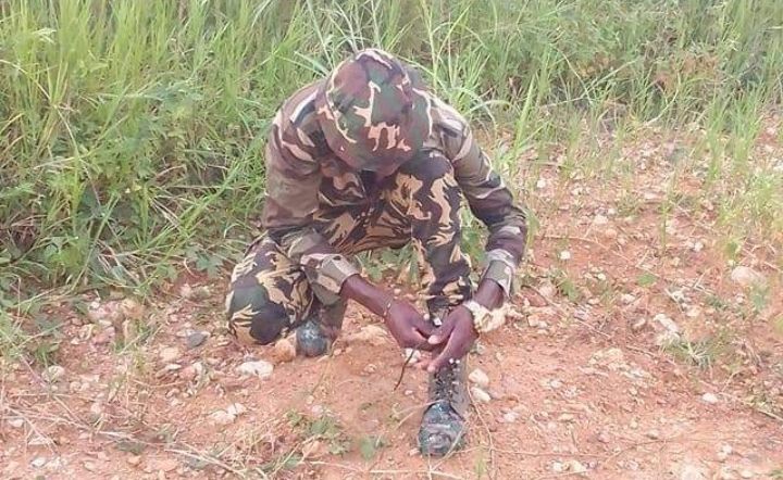 Prompt: How to lace tactical boots military ALi Boubacar