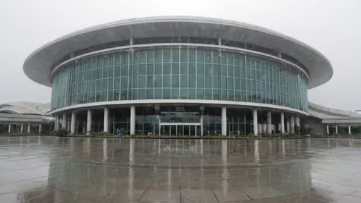 Prompt: "Zen International Convention Center, daytime, in the rain"