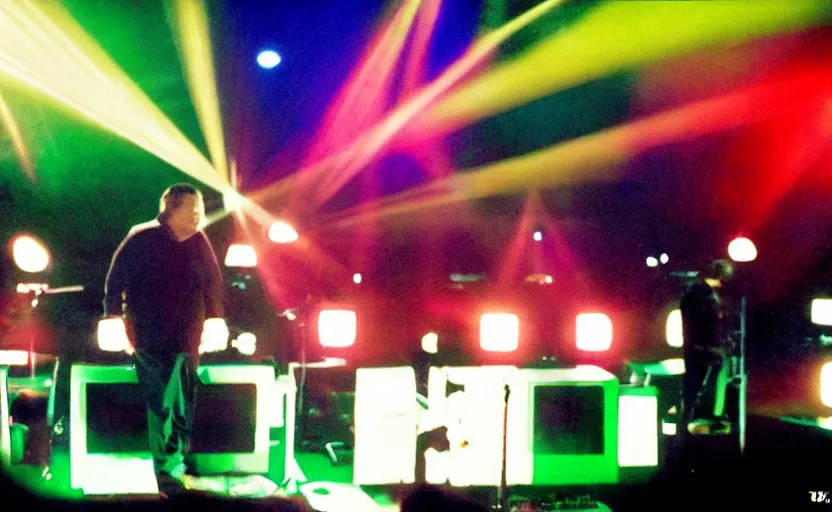 Prompt: colour photograph of 808 state on top of the pops, close up of Jimmy tarbuck blowing on a shakalute, shallow depth of field cinematic multi coloured light show in the back ground