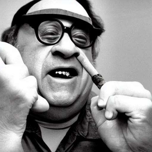Image similar to Danny Devito smoking crack out of a crack pipe, award-winning photo
