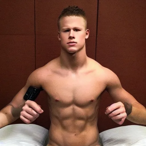 Image similar to “ a realistic detailed photo of a guy who is an attractive humanoid who is half robot and half humanoid, who is a male android, football player christian mccaffrey, shiny skin, posing like a statue, blank stare, on the bed, on display ”