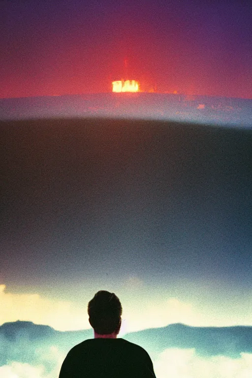 Image similar to agfa vista 4 0 0 photograph of a guy standing on top of a hill watching a city burn in the distance, back view, synth vibe, vaporwave colors, lens flare, moody lighting, moody vibe, telephoto, 9 0 s vibe, blurry background, grain, tranquil, calm, faded!,