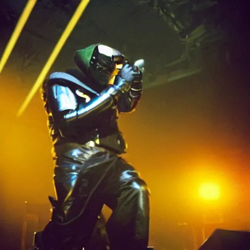 Image similar to a photo of MF DOOM performing on stage, madvillany.