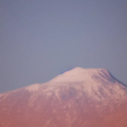 Prompt: a realistic, detailed telephoto photograph of a distant mountain shaped like an ice cream cone