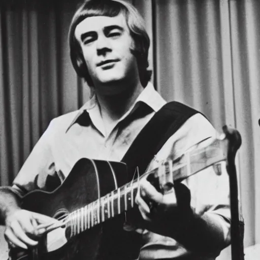 Image similar to John Sebastian playing music on stage in 1967