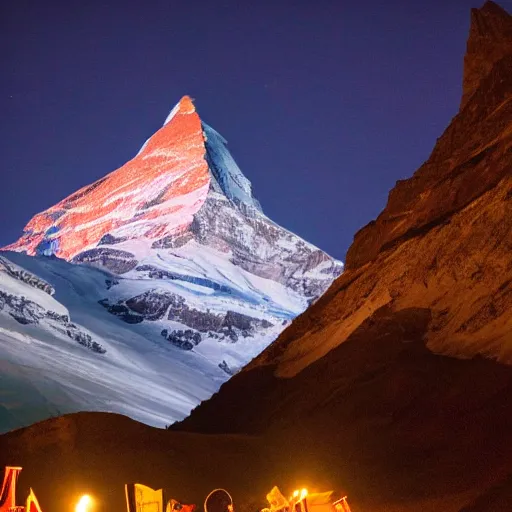 Image similar to flag of india is projected illuminated on the matterhorn mountain at night