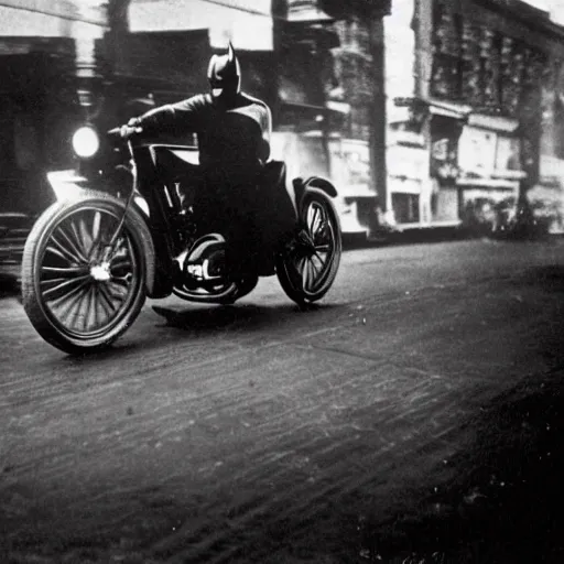 Image similar to old black and white photo, 1 9 1 3, depicting batman on a motorcycle from dark knight rampaging through the bustling streets of new york city, rule of thirds, three - point perspective, historical record