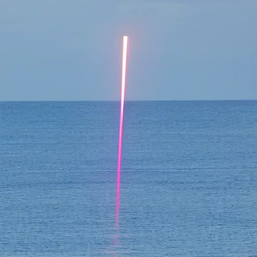 Image similar to laser beam striking the ocean