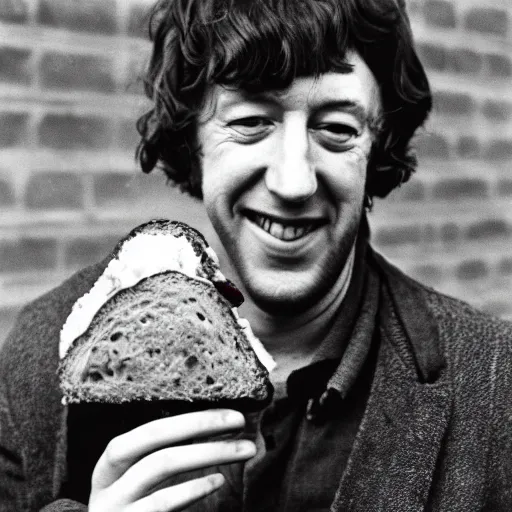 Prompt: bert jansch delightedly holding a sandwich up to the camera, photograph, 1 9 6 9