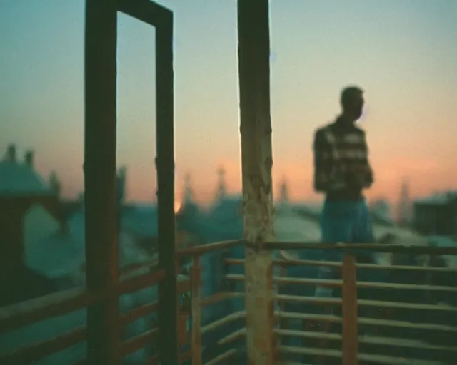 Image similar to lomo photo of pair standing on small hrushevka balcony full with cigarette smoke in small russian town looking at sunset, cinestill, bokeh