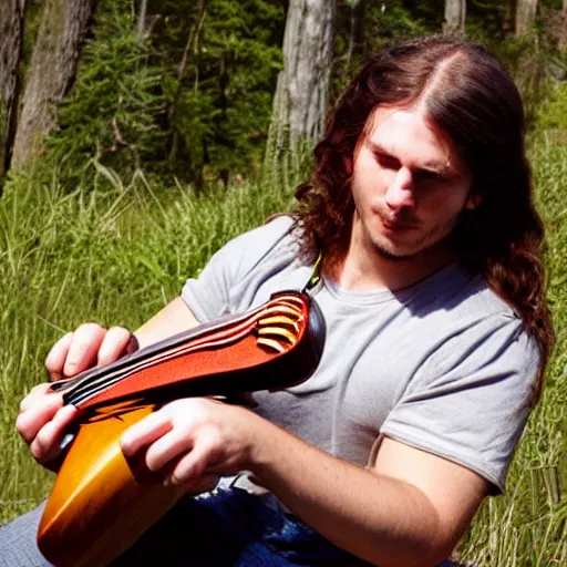 Image similar to a photo of a young man with long hair playing mandolin in the wilderness