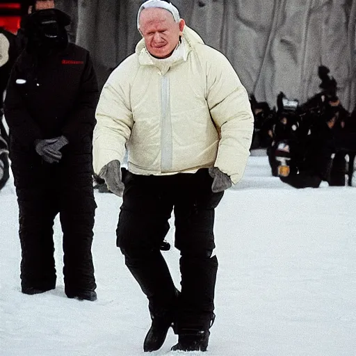 Image similar to john paul ii in a black puffed nuptse, black cargo pants and high black boots, press paparazzi photograph