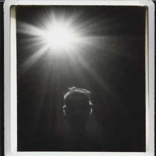 Image similar to wide angle, old polaroid of a man being illuminated by few sun rays, black and white