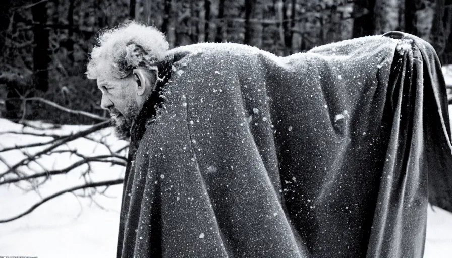 Image similar to 1 9 6 0 s movie still close up of marcus aurelius breast - plate dark cape frozen lay on the snow by the side of a river with gravel, pine forests, cinestill 8 0 0 t 3 5 mm b & w, high quality, heavy grain, high detail, texture, dramatic light, anamorphic, hyperrealistic, detailed hair, foggy