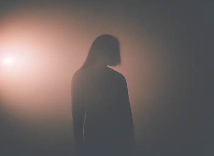 Image similar to human silhouette, large diffused glowing aura, long exposure, muted colors, film grain, cinematic lighting, experimental portrait photography,