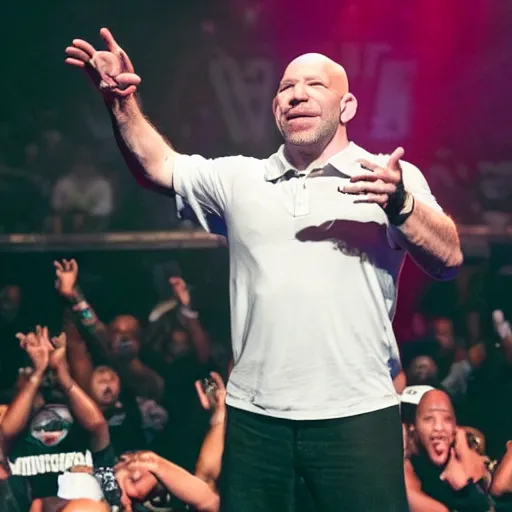 Prompt: dana white performing on stage at a rap concert