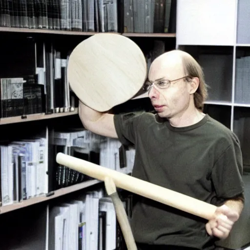 Image similar to bjarne stroustrup smashing a computer with a large mallet, photograph in an office taken in 1 9 9 5