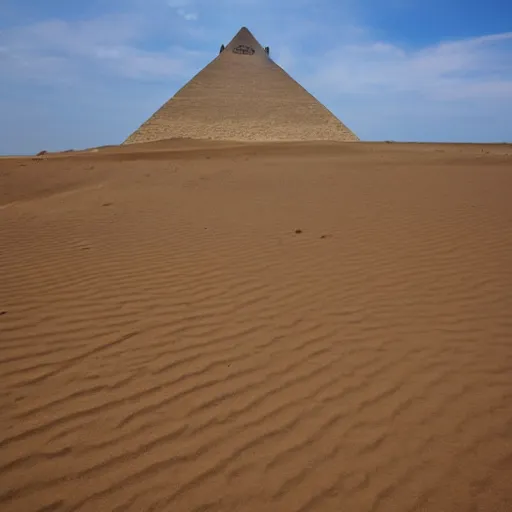 Prompt: a sand dune with a large, pyramidic temple in the middle of it.