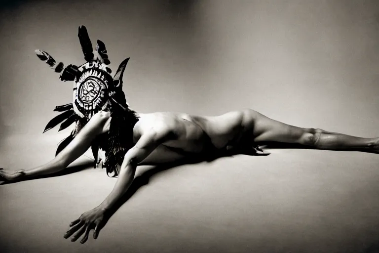 Image similar to a woman in a buffalo headdress reclining on the ground with one leg in the air, cosplay, photoshoot, studio lighting, photograph by Bruce Weber