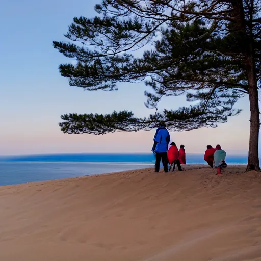 Image similar to three people watching the sun go down on the dune du pilat