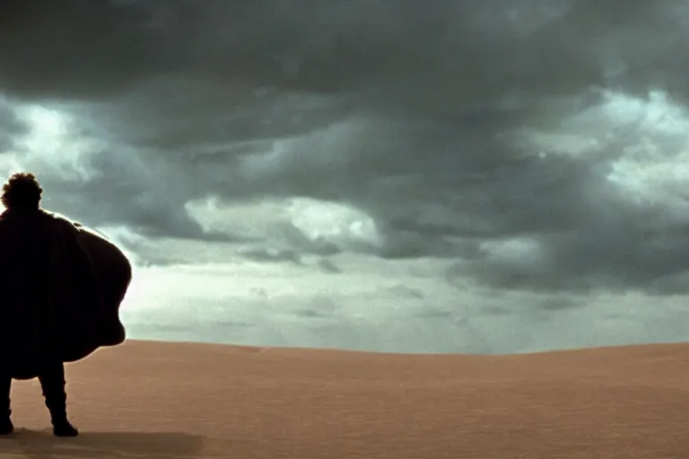 Prompt: a cinematic wide angle shot of a man in his early twenties, in the movie dune, stormy weather, dry, film still, cinematic, dramatic lighting, by zack snyder