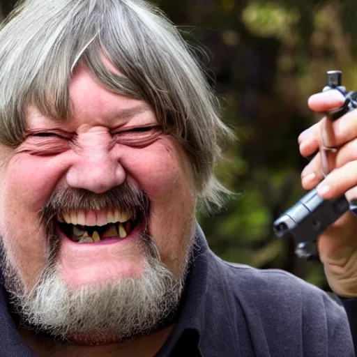 Image similar to laughing robert wyatt with mouth wide open pointing a gun directly at the camera