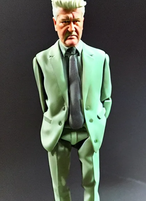 Image similar to david lynch action figure, mint in box, ebay listing