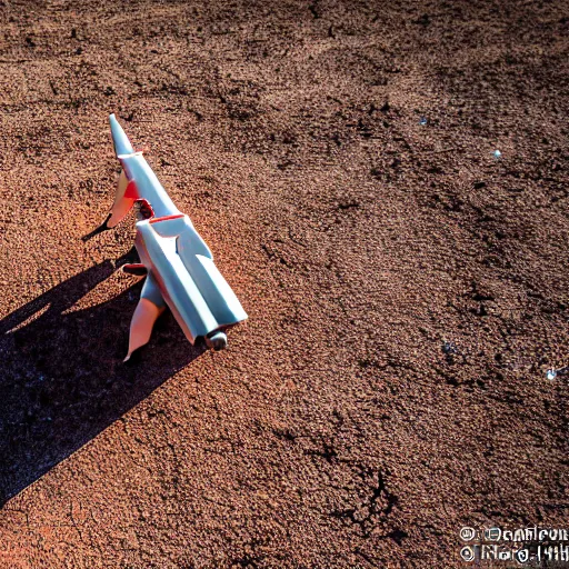 Image similar to industrial extrusion nozzle on flying radio controlled drone, extruding a clay mixture, in the australian desert, XF IQ4, 150MP, 50mm, F1.4, ISO 200, 1/160s, dawn