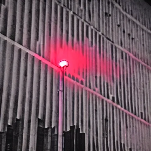 Prompt: ominous Brutalism structure. nighttime. red light. creepy fog.