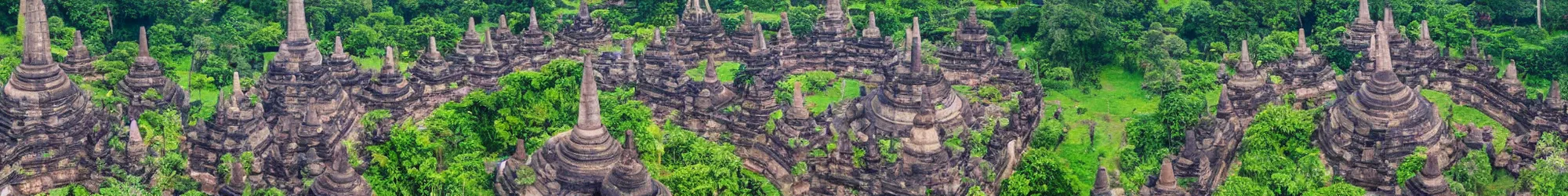 Prompt: wide angle aerial drone view of Borobudur Temple Indonesia, 3d stereoscopic equirectangular 360, fov 90 degrees, horizon centered, yaw 0 degrees