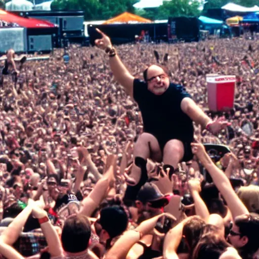 Image similar to george costanza at the vans warped tour on stage, crowd surfing