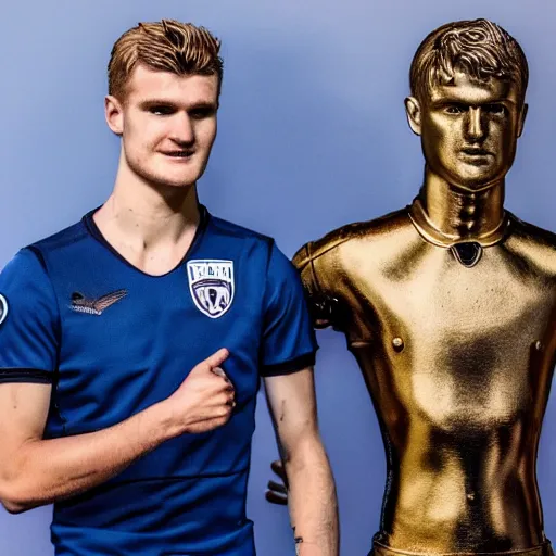 Image similar to a realistic detailed photo of a guy who is an attractive humanoid who is half robot and half humanoid, who is a male android, soccer players martin ødegaard & timo werner, shiny skin, posing like a statue, blank stare, in a museum, on display, showing off his muscles, gold soccer shorts, no jersey, several of them lined up, statue