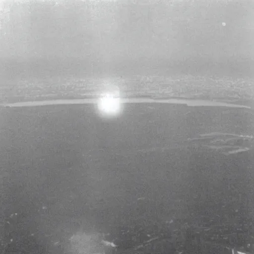 Image similar to a large nuclear crater in manhattan, there is smoking coming from the city, taken from a plane, realistic, taken on a ww 2 camera.