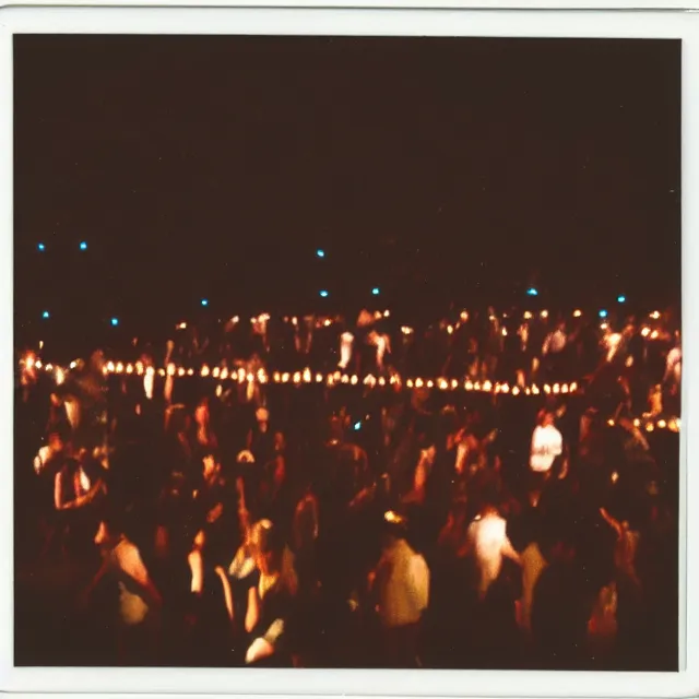 Image similar to Polaroid photograph of a busy dance floor at night, sharp focus