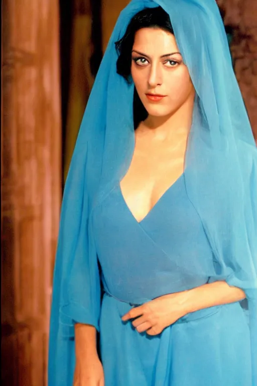 Image similar to young Monica Belluci as an Arab woman, tanned skintone, bright blue eyes, white veil, light blue dress portrait