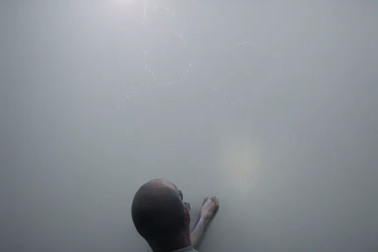 Image similar to POV top-down photo of my diverse arms digging inside an impossible aerogel portal containing a stack of aerogel pads/tablets with handles and knurling grip and node-based visual programming language (glowing patch cables looping OLED volumetric windows) scale model floating in midair in front of me: brilliant daylight emerging from the thick fog, Leica 8K still from an A24 film-H 1280