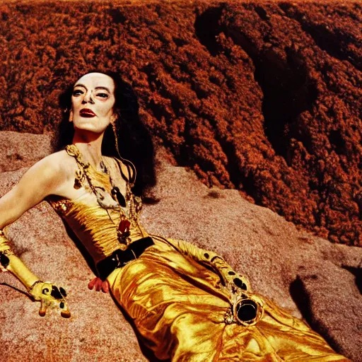 Image similar to salvador dali wearing a golden dress with jewels in a dry rocky desert landscape, visible sky and sunny atmosphere, film still from the movie by alejandro jodorowsky with cinematogrophy of christopher doyle and art direction by hans giger, anamorphic lens, kodakchrome, very detailed photo, 8 k