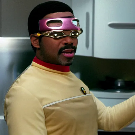 Image similar to Geordi LaForge wearing visor and a colander and random kitchen tools on his head