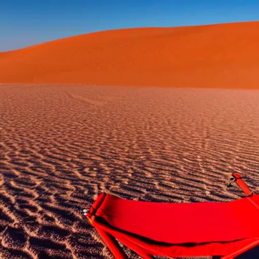 Image similar to a red camping chair in the middle of the sahara desert. the chair is 1 0 feet away from the camera.
