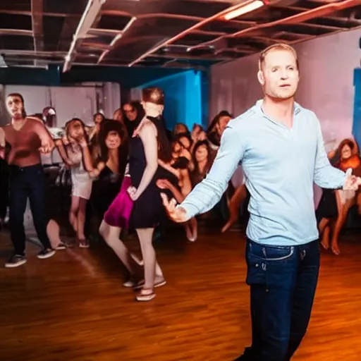 Image similar to photo of a 4 0 year old white man living thinking he's living the best life possible. he looks young for his age. he is at a dance club, it's as if he were in a music video. woman are flocking to him and can be seen dancing around him in a seductive manner.