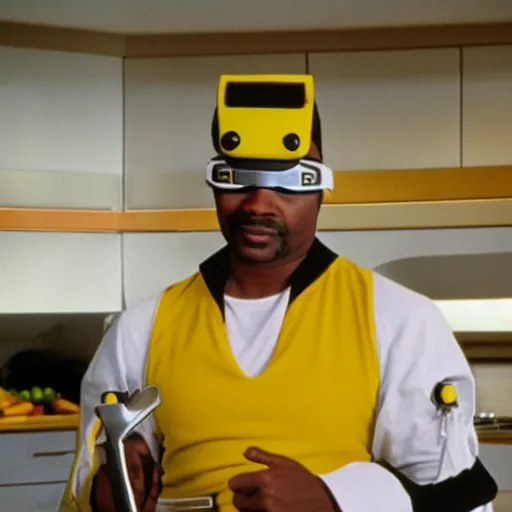 Image similar to Geordi LaForge wearing visor and a colander and random kitchen tools on his head