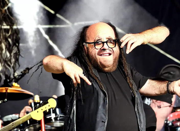 Image similar to publicity photo still of danny devito touring with korn live on stage, 8 k, live concert lighting, mid shot