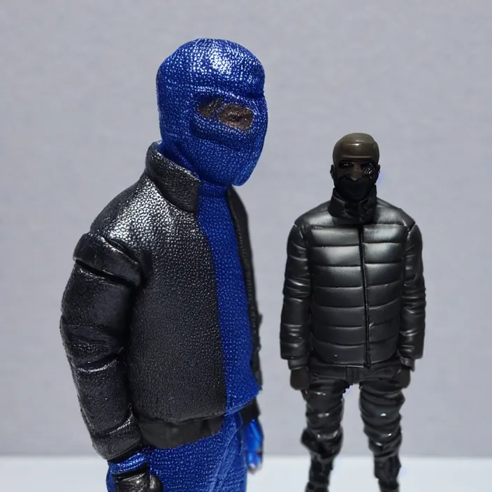 Prompt: a action figure of kanye west using a full face covering black mask, a small, tight, undersized reflective bright blue round puffer jacket made of nylon and big black balenciaga rubber boots, figurine, detailed product photo