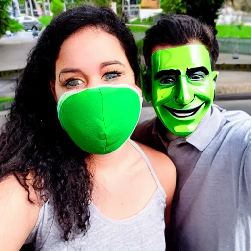 Prompt: a man in a green rubber mask takes a selfie with a girl